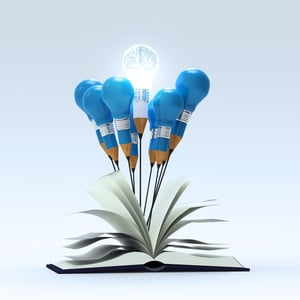 open book with 3d metal human brain inside pencil light bulb as concept
